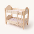 Wooden rainbow doll bunk bed with ladder and star bedding on white background