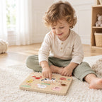 Farm Touch & Sound Wooden Puzzle - boy playing on rug