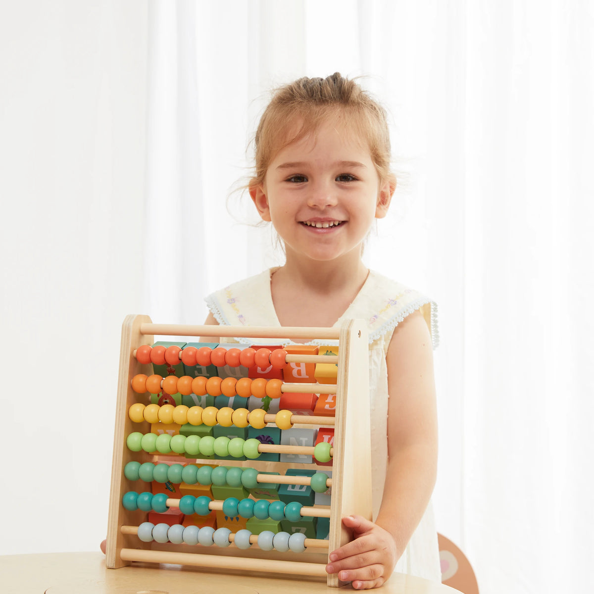 2-in-1 Abacus Stand & Alphabet Abacus - girl holding portrait