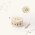 The Talker Growing Play Box - montessori months wooden drum with drumstick closeup