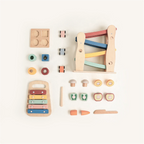 The Player Growing Play Box - montessori months gift set accessories flat lay