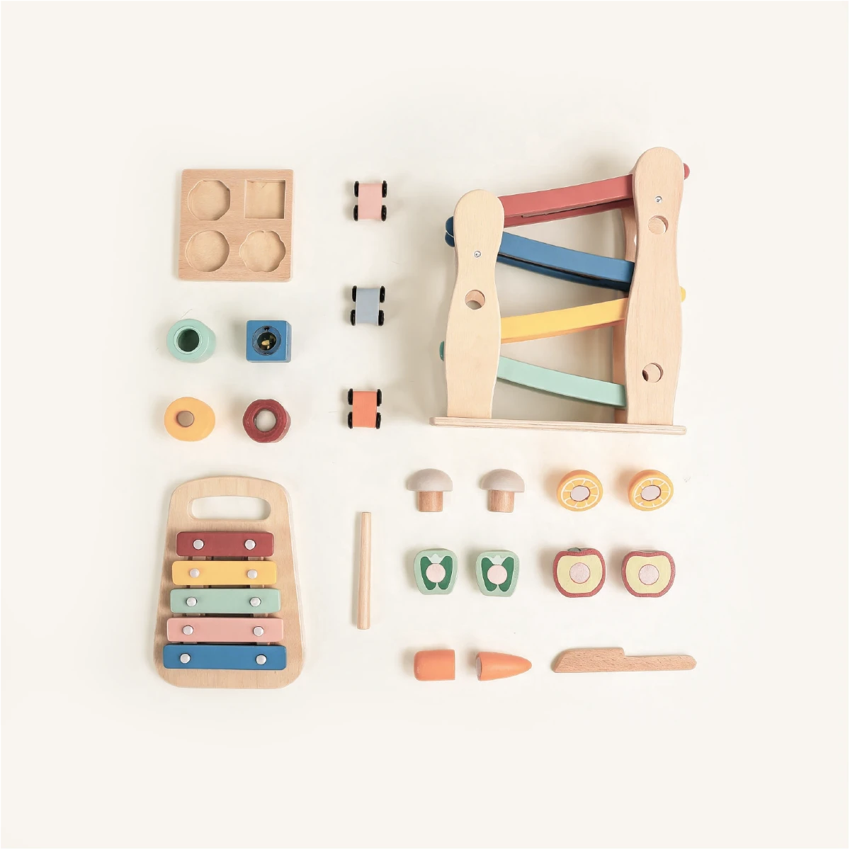The Player Growing Play Box - montessori months gift set accessories flat lay
