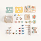 The Explorer Growing Play Box - montessori months gift set accessories flat lay