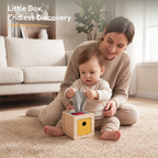 The Discoverer Growing Play Box - mother and baby playing with the tissue box together