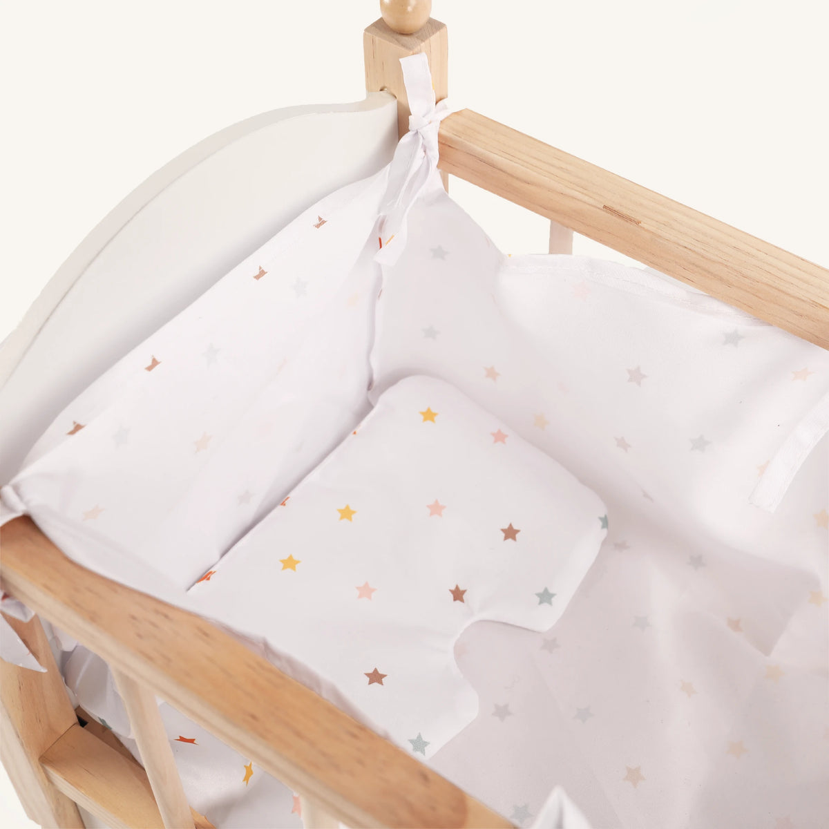 Freniland wooden doll crib star bedding closeup