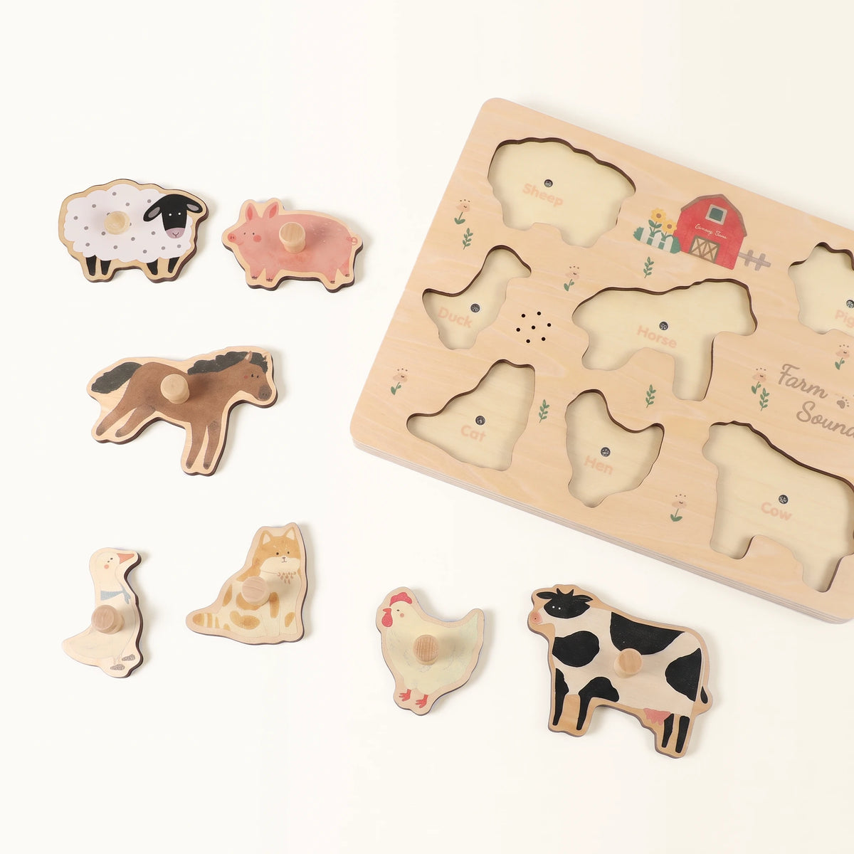 Freniland wooden farm sound puzzle pieces around board