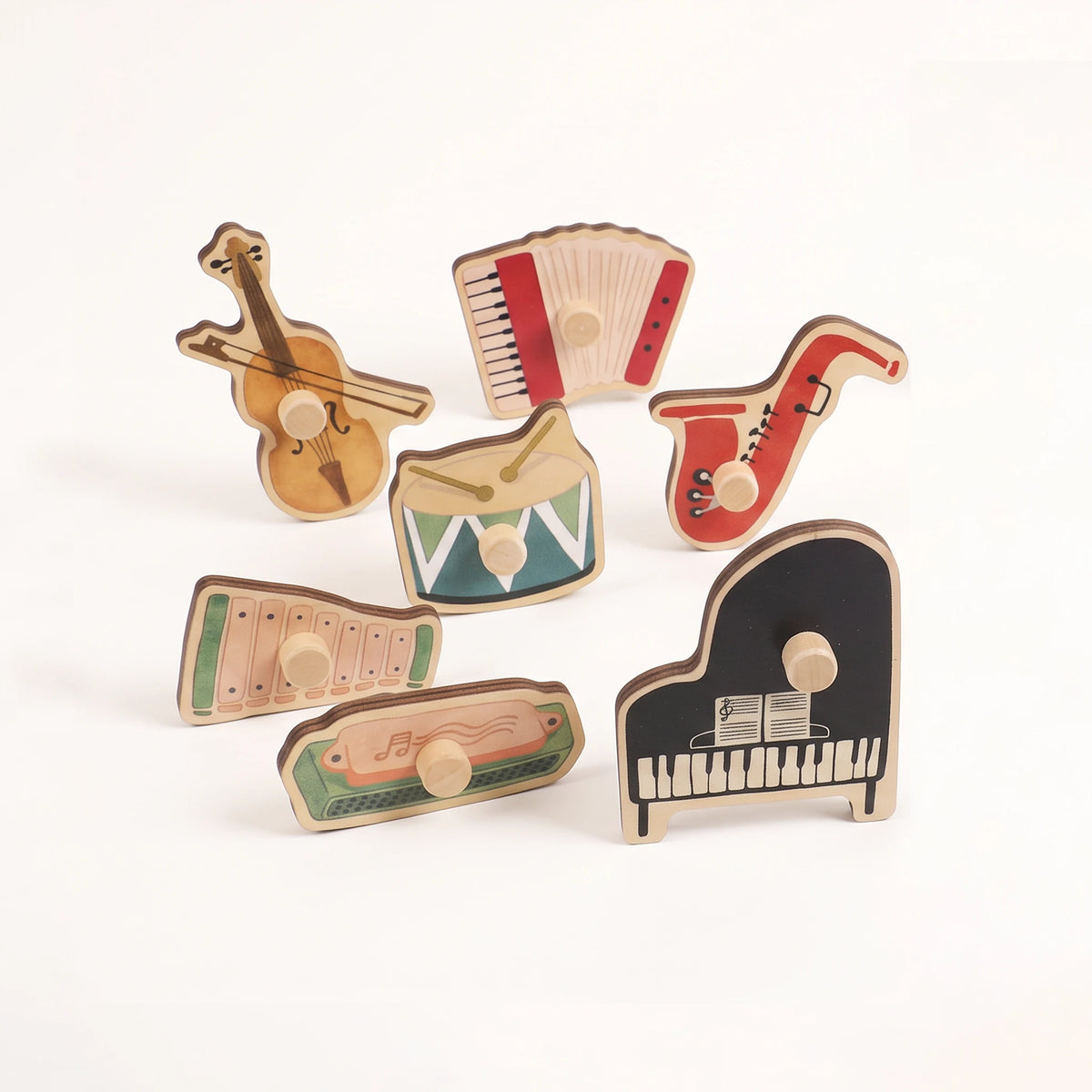 Freniland Wooden Sound Puzzle 2-Pack - seven musical instrument peg pieces, group view