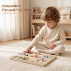 Freniland Wooden Sound Puzzle 2-Pack - child playing with the Traffic Sounds board on the floor