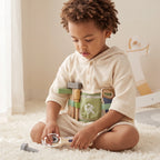 Freniland wooden tool belt toddler playing wrench closeup