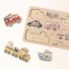 Freniland Wooden Sound Puzzle 2-Pack - Traffic Sounds board with seven vehicle pieces laid out