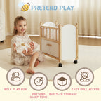 Young girl playing with a doll and wooden toy doll crib with storage
