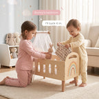 Wooden doll bed two toddlers tucking bunny