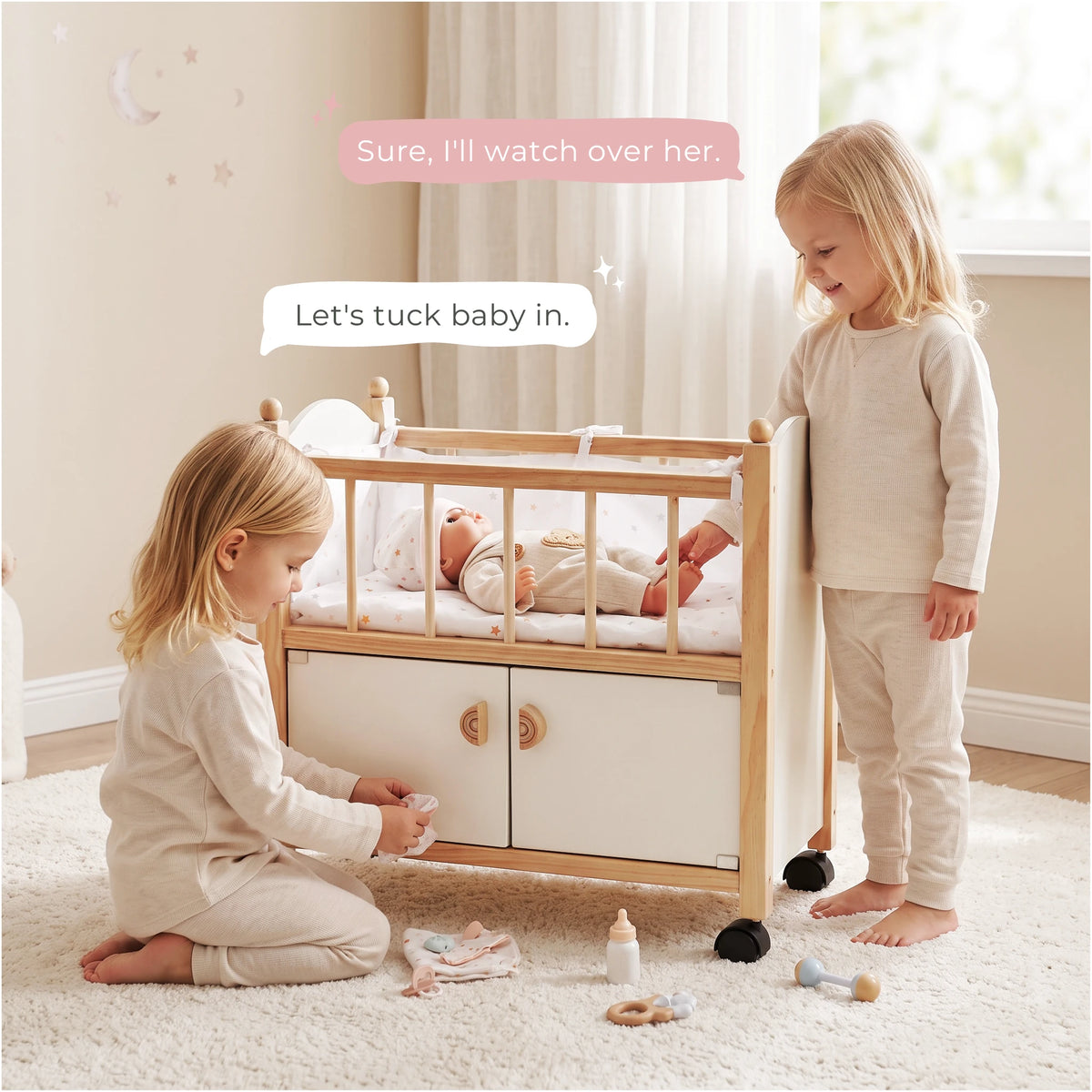 Wooden doll crib two girls tucking baby lifestyle