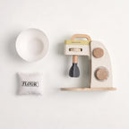 Wooden stand mixer flatlay with bowl and flour
